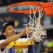 Michigan sophomore Trey Burke cuts down a section of the net after beating Florida to win the NCAA South Regional Championship and advancing to the Final Four at Cowboys Stadium on Sunday, March 31, 2013. Melanie Maxwell I AnnArbor.com